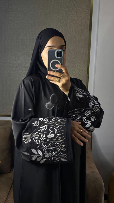 Shop our black abaya dubai style a stunning embroidery dubai abaya in premium Nida fabric with hijab.