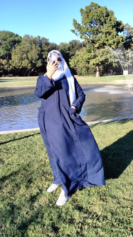 Elevate your look with our navy blue long dress, a flowy linen navy maxi dress with sleeves & side pockets. 